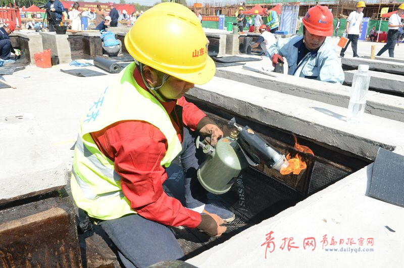 比速度拼質(zhì)量！青島農(nóng)民工建筑技能大比拼(圖2)